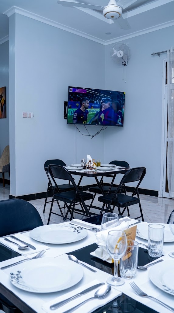 Prepared dining tables at Giovanna Executive Lodge